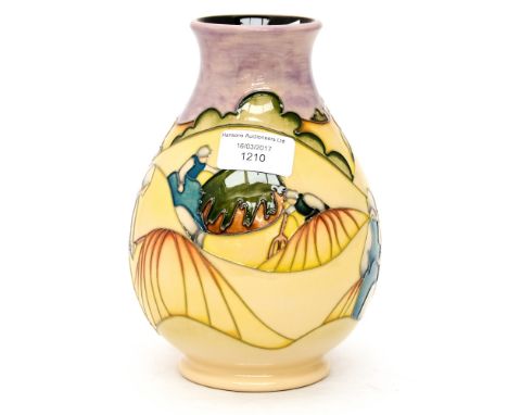 A Moorcroft trial vase in the 'haystacks' pattern, signed by designer to base, K. Goodwin, measuring approx 19cm high