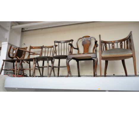 Two early 19th Century elm seated kitchen chairs, two later 19th Century elm seated stick back Windsor chairs and an elm chil