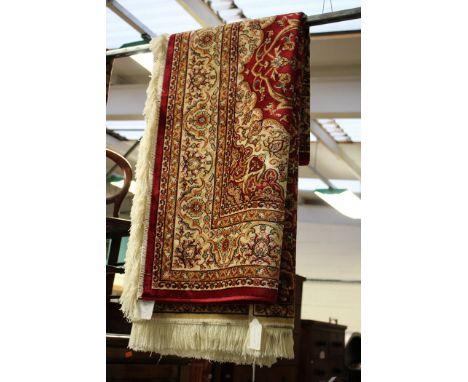 A beige ground Heriz carpet, 230cm high, 160cm wide