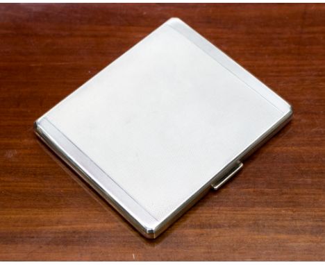 An Edward VIII Art Deco silver cigarette case, the front and back having engine turned decoration, the interior gilded, maker