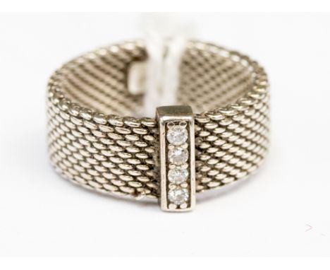 Tiffany silver mesh ring with four diamonds set in a bar  style. Ring width is 6mm size J 1/2 with a total gross weight of 3.