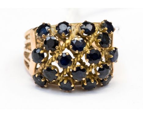 A multi stone sapphire cluster ring, stamped 14k  gold, size P½, approx gross weight 6.6 grams 