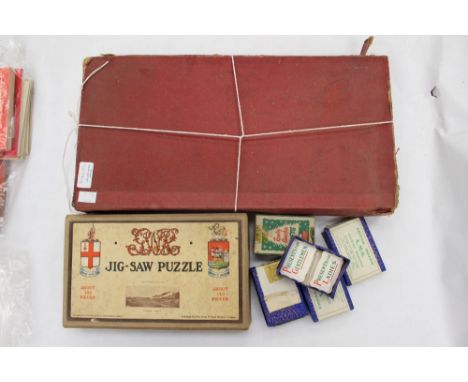 A boxed print block set with four boxes of advertising cards and a boxed wooden jigsaw 