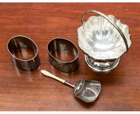 A silver pedestal bon bon dish, Birmingham 1906, with two silver napkin rings and a silver caddy spoon with ivory handle, mak