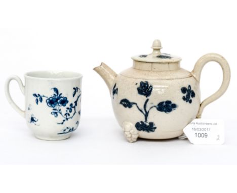 A Worcester blue and white coffee cup, together with a miniature teapot with raised decoration, both circa 1770