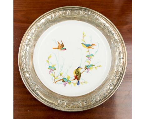 An 1885 London, rimmed silver Spode hand painted plate with bird design leaf and fruit on silver border 
