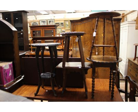 A small collection of various furniture, comprising a Victorian Gothic oak trestle stool, a three legged carved mahogany stoo