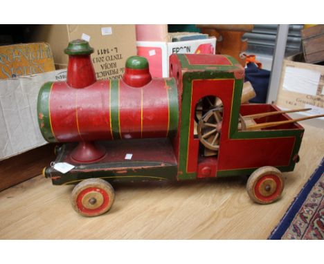  A wooden ride on train engine with a wooden toy trap (2)