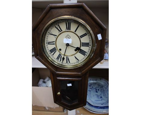 An oak drop dial wall clock, and a modern mahogany large wall clock (2)