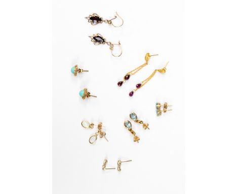 A selection of 9ct gold gemstone earrings, including opal, turquise, blue topaz, garnet and cz  stones approx seven pairs, wi