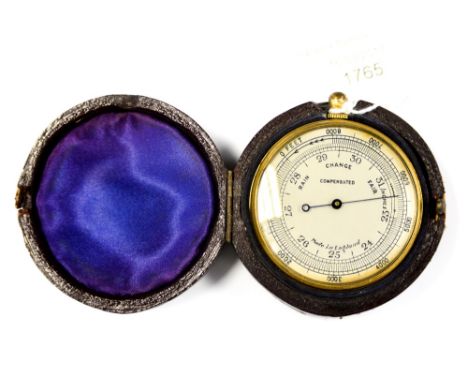 A gilt metal 20th Century hand held English hand held barometer 