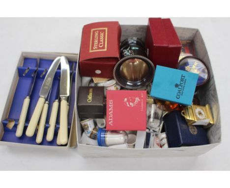 A large collection of thimbles, a miniature clock, EPNS cigarette server and faux amber egg and stand etc