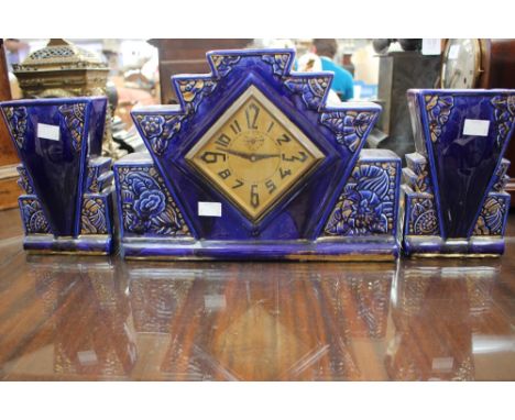 A French deep blue clock garniture with key, stepped design with Art Deco raised floral design, underside ODYV 19 (3) 