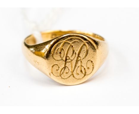 An eighteen carat gold signet ring with RR initials, approx weight 4.5gm, approx size K