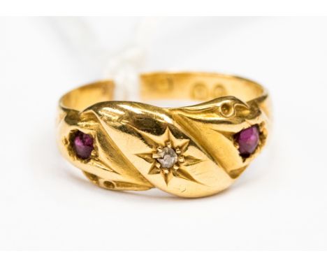 An 18ct gold and Diamond and Ruby star set ring, size I, approx total gross weight 1.9gms