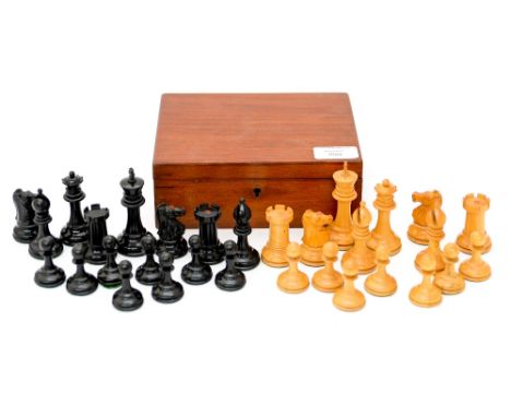 A Staunton chess set in mahogany box, the chess pieces of ebony and satinwood 