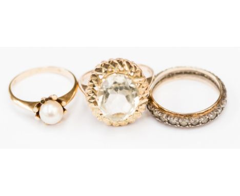 Three ladies rings in nine carat gold set with semi precious stones, ring sizes K, N and N 1/2, total gross weight approximat