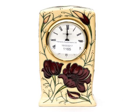 A Moorcroft mantle clock in the 'chocolate cosmos' pattern
