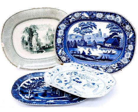 A Spode blue and white charger, with a green and white Victorian charger and two other further blue and white charges 