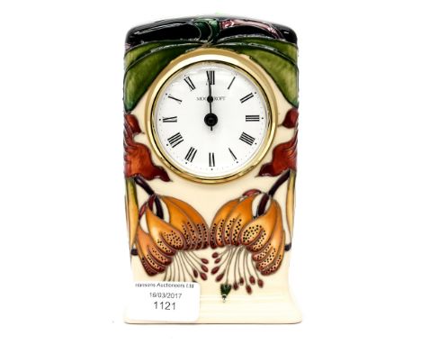 A Moorcroft mantle clock in the 'Anna Lily' pattern
