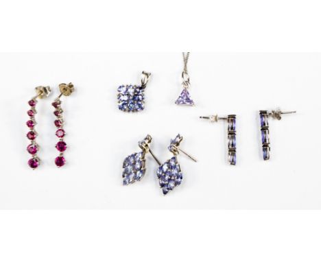 A selection of five silver items including a lilac triangular CZ pendant with chain, one tanzanite pendant with marquise and 