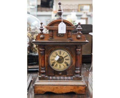 A Mahogany Thos Fattorinis 'Bugler' alarm clock with string, key, and pendulum Roman numerals to dial 