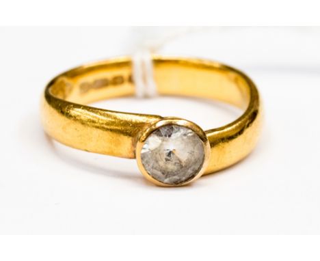 A White sapphire solitaire ring set in 22ct ring, size Q, approx total weight 6.5 grams 
