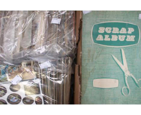 Two postcard albums with two bags of postcards