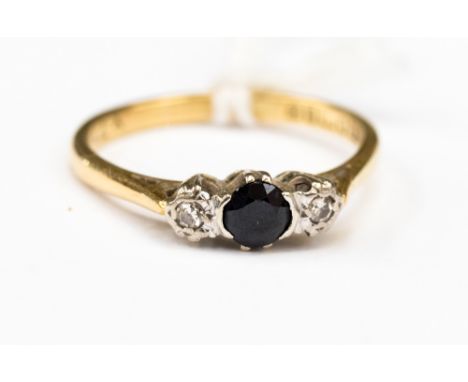 A Sapphire and diamond 3 stone dress ring set in 18ct gold, ring size P, total gross weight approx 3gms 