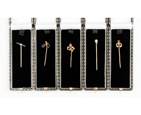 Five assorted Victorian and Edwardian yellow and rose metal stick pins to include old European cut diamond set geometric desi