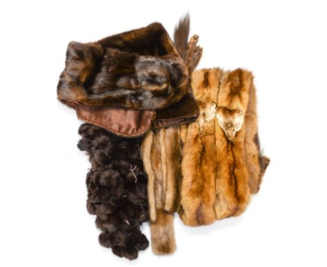 A Mink stole, fox tipped stole, fur scarf and a fur belt (4) (two bags) 
