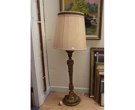 Gilt metal light fitting with rose and leaf detailing and with gilded brass light fitting with ribbon detailing; together wit