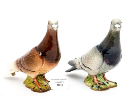 Two Beswick figures of 'Pigeons', model No 1385, one painted in black the other in brown