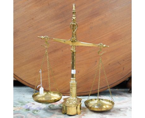 A set of brass 'Bank' scales with metric weights 