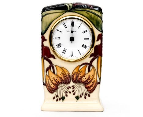 A Moorcroft mantle clock in the 'Anna Lily' pattern
