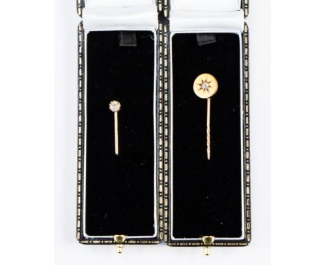 Two diamond yellow metal stick pins, to include diamond old European cut approximately 0.33 carat and gypsy set old European 