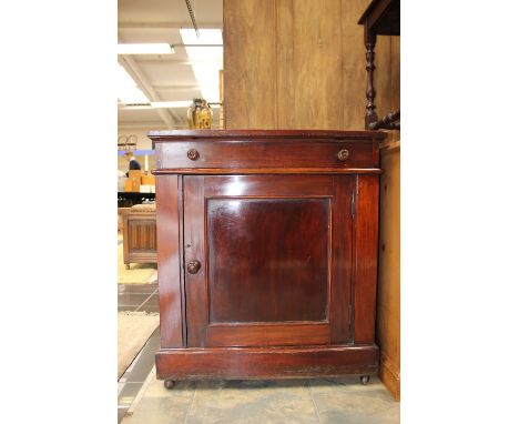 A late Victorian mahogany side cabinet, fitted with a single panelled door, believed to be from the ticket office at Derby Mi