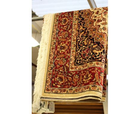 A Red ground Keshan Carpet 190cm x 140cm.