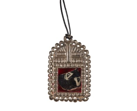 § GRAYSON PERRY C.B.E., R.A. (BRITISH 1960-) RELIQUARY 2009, ceramic fragment in incised metal pendant on waxed leather strin