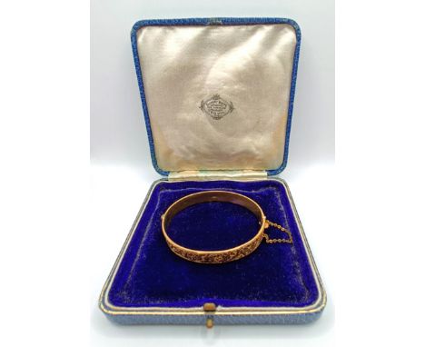 A 9ct gold bangle, 22 g