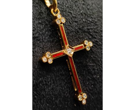A modern Faberge 18ct gold, red enamel and diamond cross pendant with an 18ct gold chain, No F1897RT 42/1000, approx. diamond
