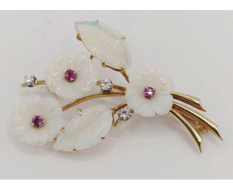 An 18ct gold, carved opal, ruby and diamond floral brooch