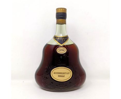 A bottle of Hennessy Extra cognac