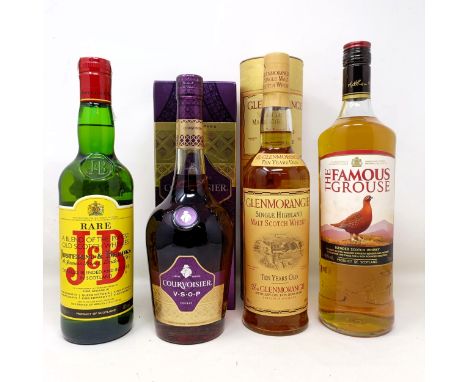 A litre bottle of Famous Grouse whisky, a bottle of J &amp; B Rare whisky, a bottle of Glenmorangie, 10 years old, with a tub