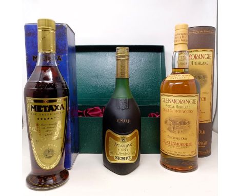 A litre bottle of Glenmorangie, 10 years old, with its tube, a bottle of Sempe VSOP armagnac, boxed, and a bottle of Greek Me