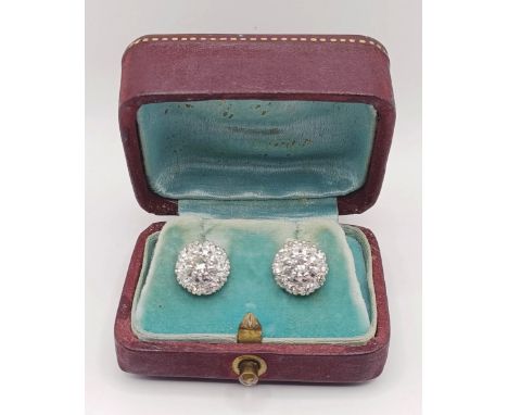 A pair of diamond cluster stud earrings, in a vintage jewellery box