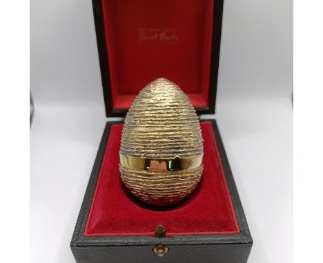 A silver gilt and enamel surprise egg, Stuart Devlin, no. 74, London 1975, boxed