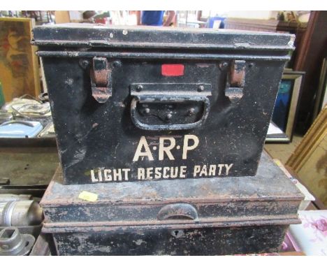 Two metal boxes, one marked ARP Light Rescue Party