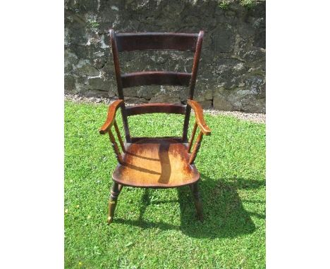 A 19th century country style ladder back arm chair