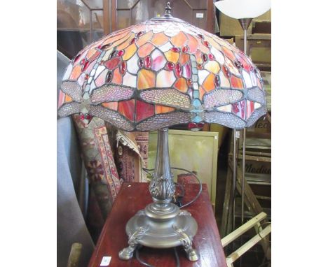 A Tiffany style table lamp, the leaded glass shade decorated with dragonflies&nbsp;